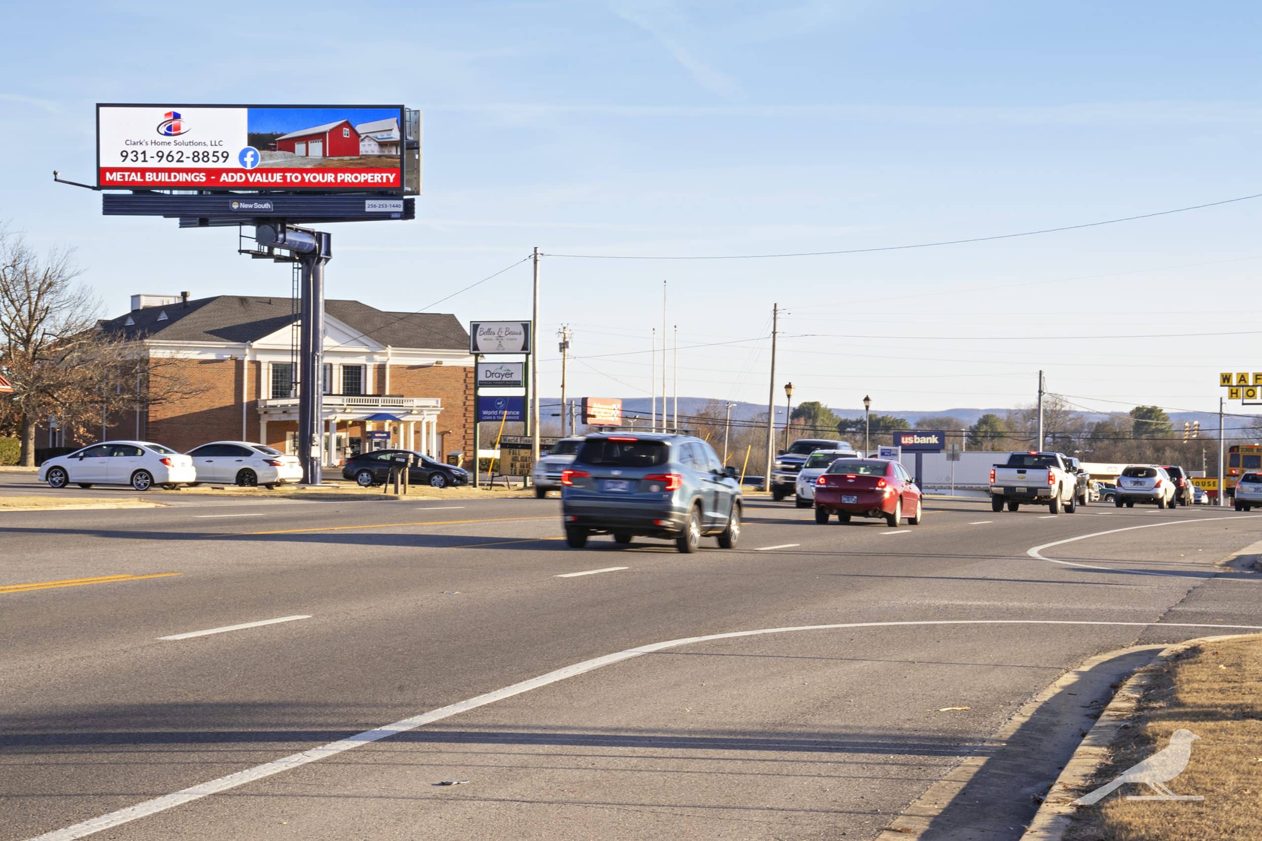 a sign on the side of a road